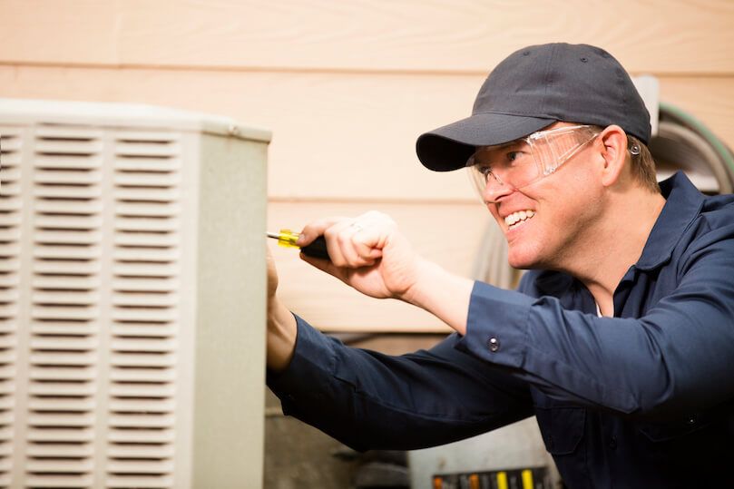 Woman installing AC