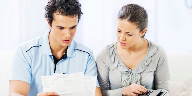 Couple checking utility bills