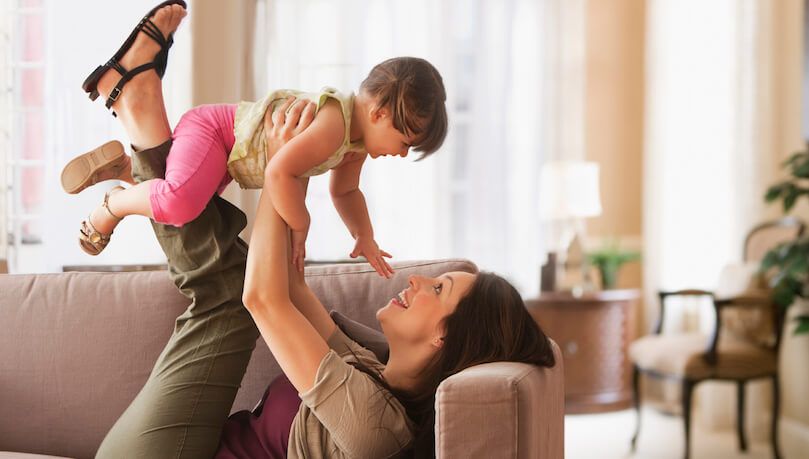 Mom & daughter enjoying home comfort