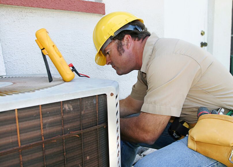 AC Service Tech at Work