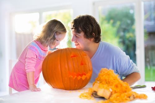 Father Daughter Enjoying Air Conditioning in Fall