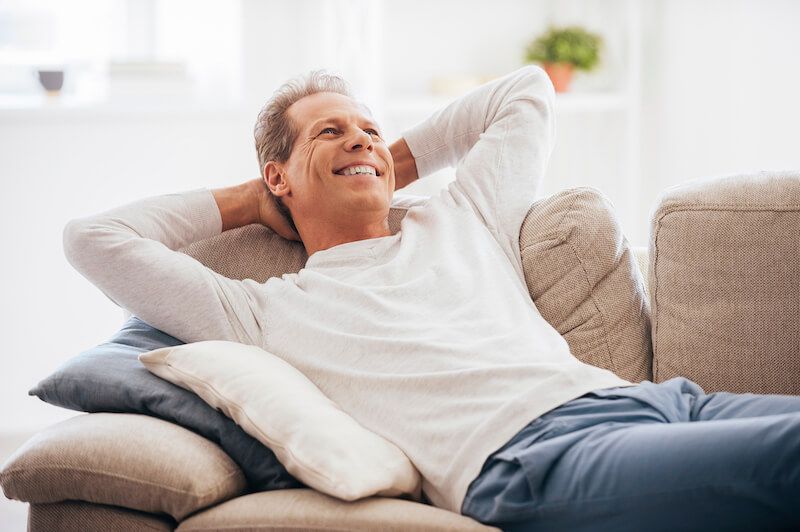 Man relaxing in AC